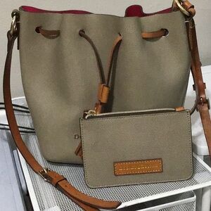 Dooney & Bourke Cream Shoulder Bag with Drawstring Closure and Tassels